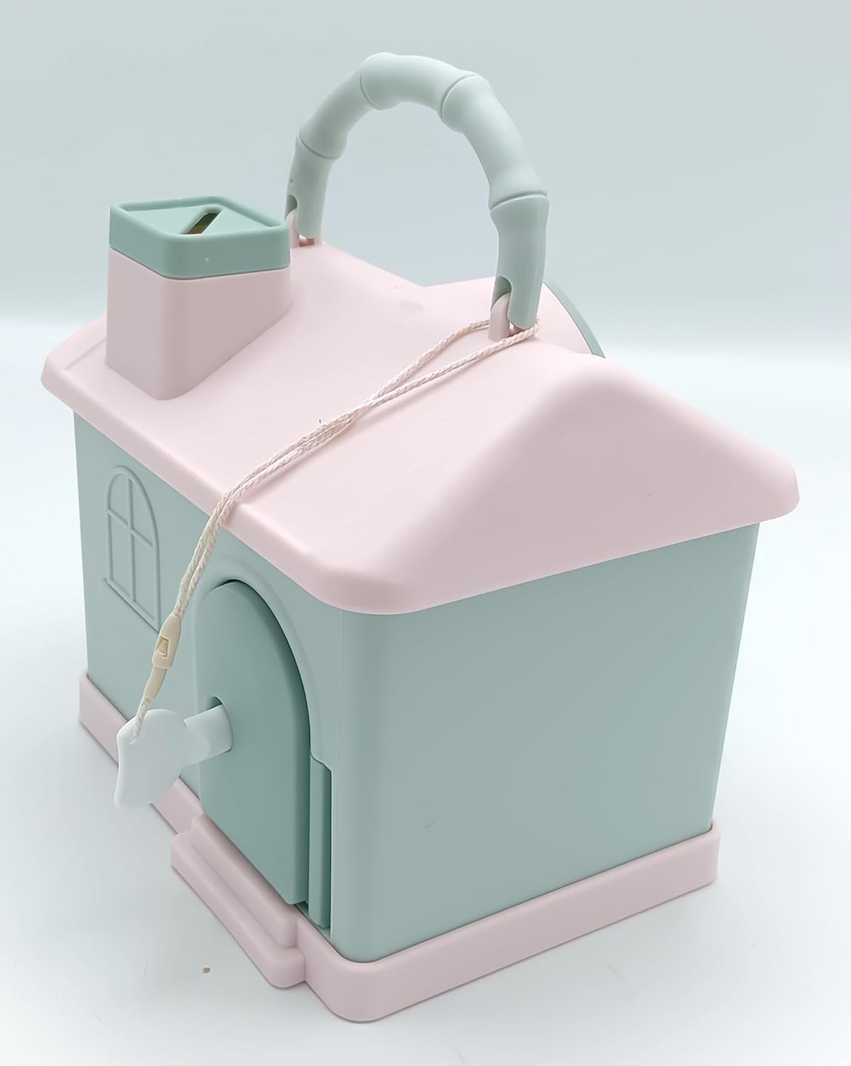 Kids' house money bank with lock, key, and 3D sticker compatibility, in pastel pink and blue. www.usmile.toys